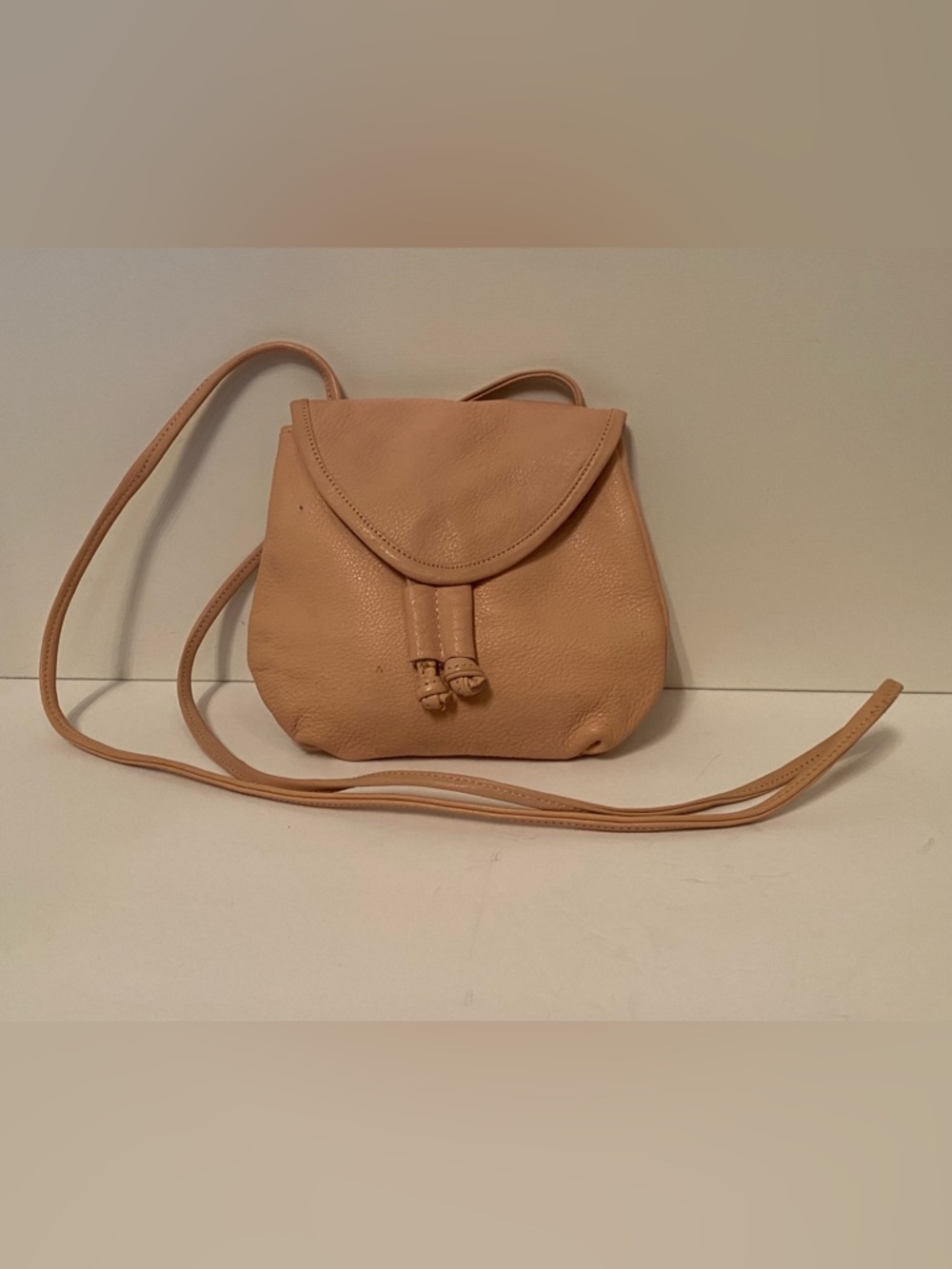 INDIA BAG MINI CROSSBODY PALE PINK LEATHER TIE ACCENT LONG STRAP SNAP FLAP